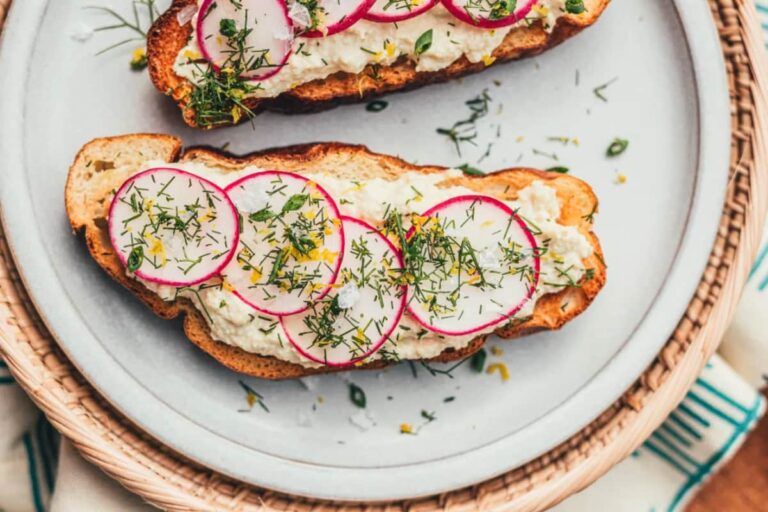 A dish of Tofu Ricotta Toast with Radishes.