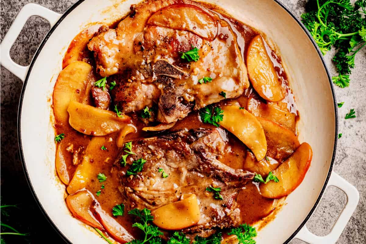 A dish of Bourbon-Glazed Pork Chops with Apples.