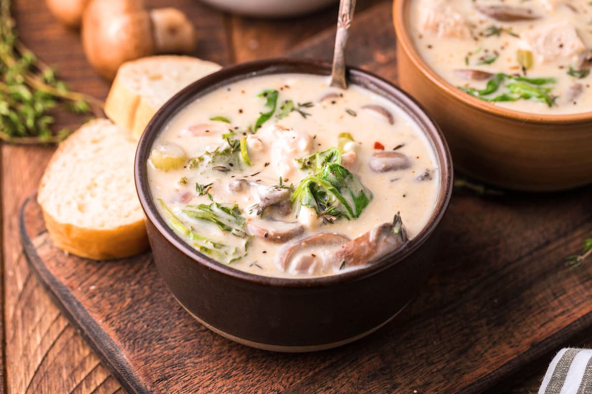 A dish of Creamy Mushroom Kale Turkey Soup.