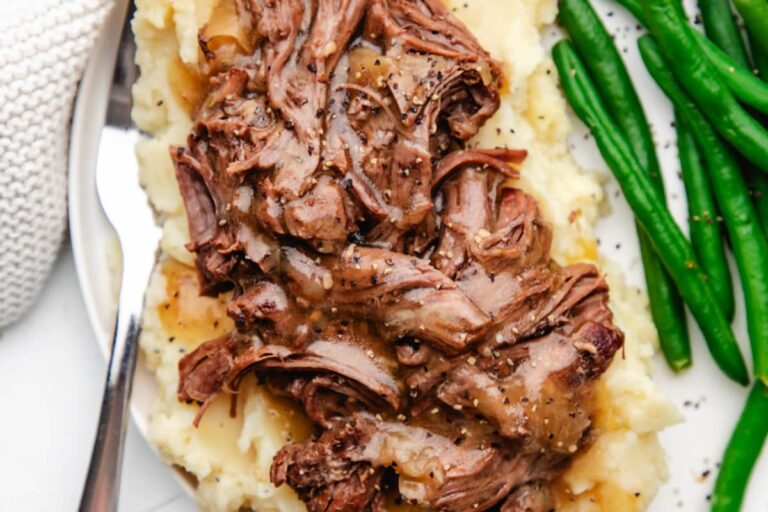 A dish of Instant Pot Garlic Rosemary Pot Roast.