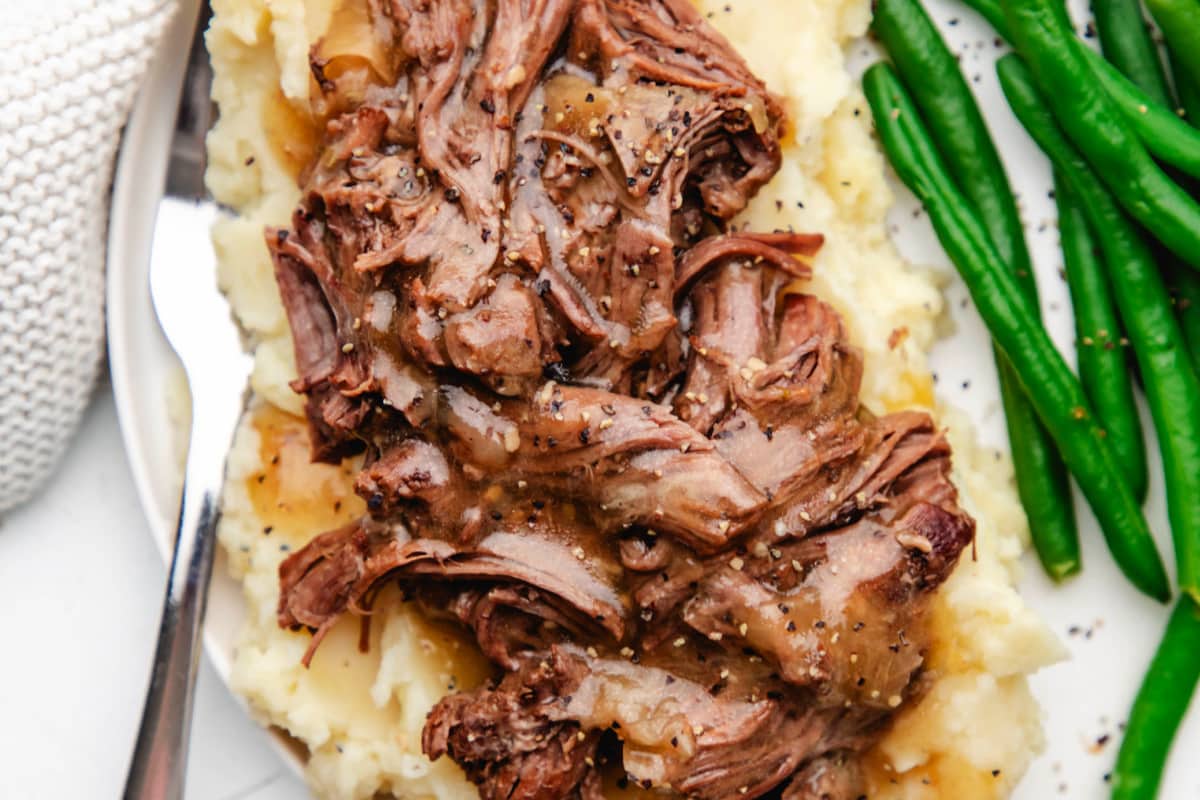 A dish of Instant Pot Garlic Rosemary Pot Roast.
