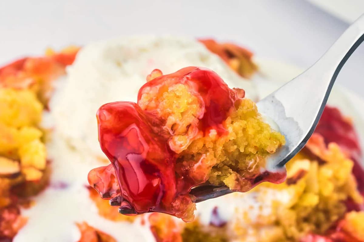 A dish of Crock Pot Cherry Dump Cake.